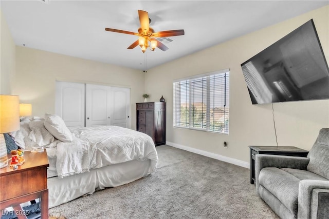10420 Loma Portal Ave, Las Vegas, NV 89166 - bedroom with carpet flooring, baseboards, a closet, and a ceiling fan