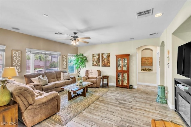 10420 Loma Portal Ave, Las Vegas, NV 89166 - living area featuring ceiling fan, light wood-style flooring, and baseboards