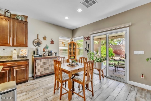 10420 Loma Portal Ave, Las Vegas, NV 89166 - dining space with wood finish floors, baseboards, and recessed lighting