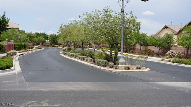 10420 Loma Portal Ave, Las Vegas, NV 89166 - view of asphalt street featuring curbs