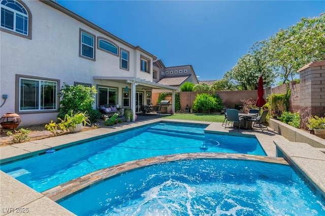 10420 Loma Portal Ave, Las Vegas, NV 89166 - view of pool featuring a pool with connected hot tub, a fenced backyard, outdoor dining space, a patio area, and area for grilling