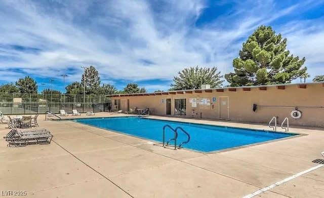 3766 Colonial Dr, Las Vegas, NV 89121 - community pool featuring a patio area