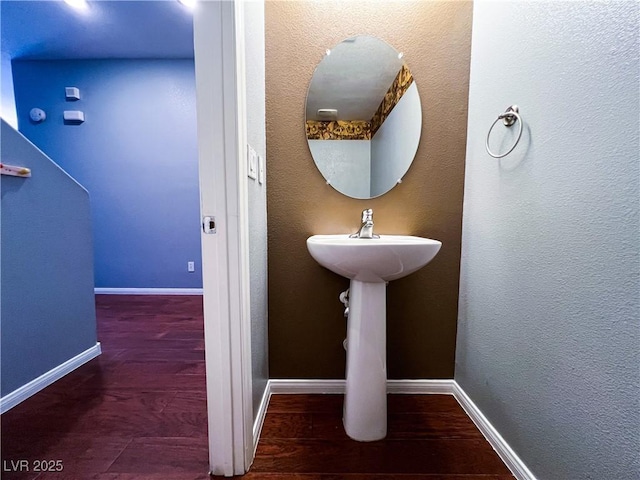 3412 Catherine Mermet Ave, North Las Vegas, NV 89081 - bathroom with wood finished floors and baseboards