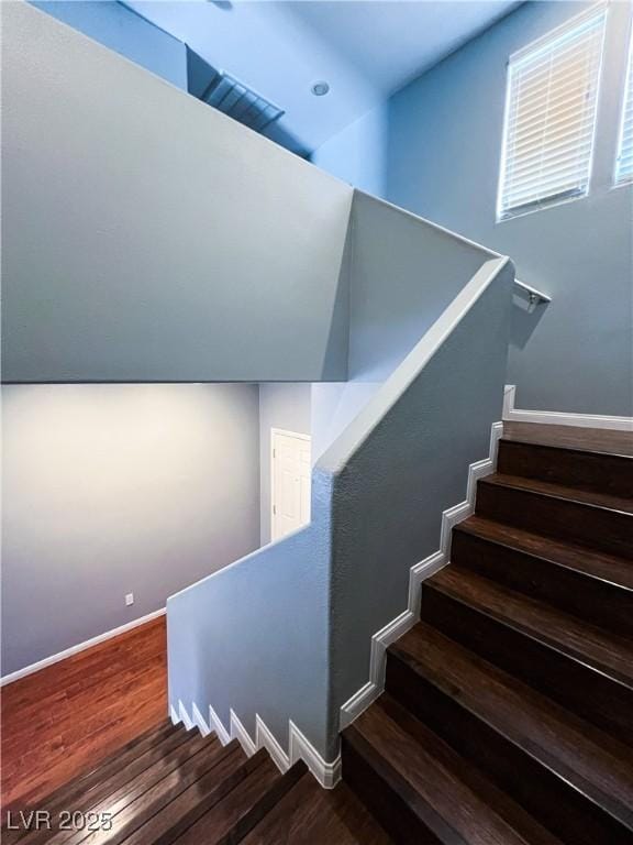 3412 Catherine Mermet Ave, North Las Vegas, NV 89081 - staircase featuring wood finished floors and baseboards