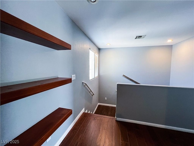 3412 Catherine Mermet Ave, North Las Vegas, NV 89081 - stairway featuring wood finished floors, baseboards, and recessed lighting