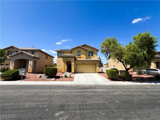 3412 Catherine Mermet Ave, North Las Vegas, NV 89081 - mediterranean / spanish-style house featuring solar panels, an attached garage, driveway, and stucco siding