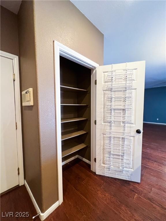 3412 Catherine Mermet Ave, North Las Vegas, NV 89081 - detailed view of wood finished floors and baseboards