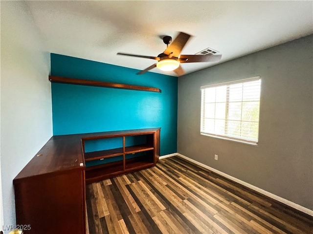 3412 Catherine Mermet Ave, North Las Vegas, NV 89081 - unfurnished bedroom featuring wood finished floors, baseboards, and ceiling fan