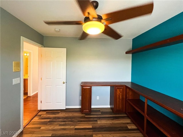 3412 Catherine Mermet Ave, North Las Vegas, NV 89081 - unfurnished office with dark wood finished floors, a ceiling fan, and baseboards