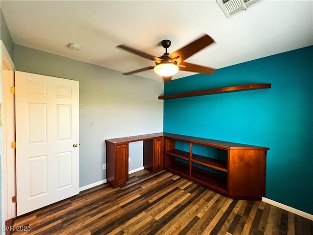 3412 Catherine Mermet Ave, North Las Vegas, NV 89081 - unfurnished office featuring ceiling fan, dark wood-type flooring, and baseboards