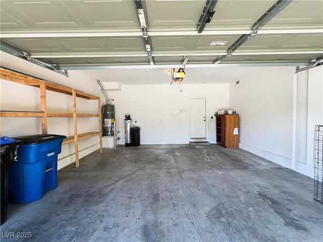 3412 Catherine Mermet Ave, North Las Vegas, NV 89081 - garage featuring secured water heater and a garage door opener