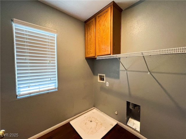 3412 Catherine Mermet Ave, North Las Vegas, NV 89081 - laundry room with cabinet space, washer hookup, baseboards, dark wood-type flooring, and hookup for a gas dryer
