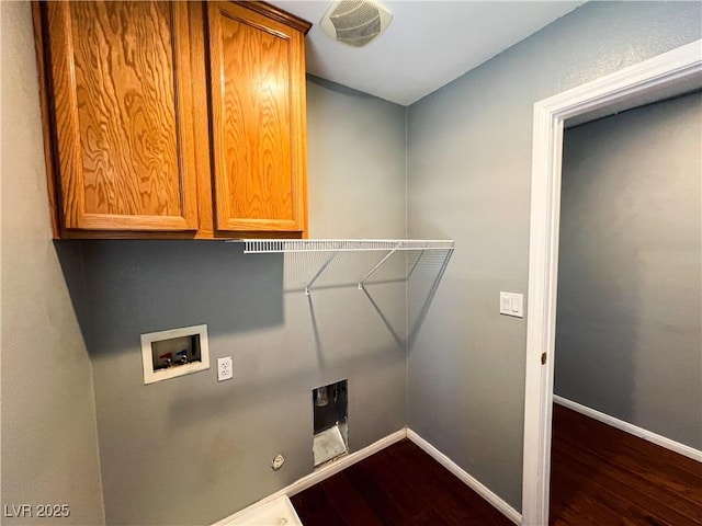 3412 Catherine Mermet Ave, North Las Vegas, NV 89081 - laundry room with hookup for a washing machine, cabinet space, dark wood finished floors, and baseboards