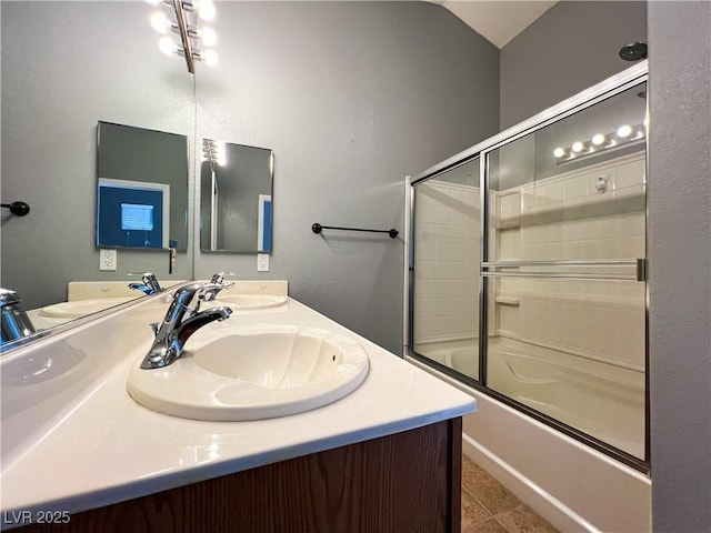 3412 Catherine Mermet Ave, North Las Vegas, NV 89081 - bathroom featuring shower / bath combination with glass door, double vanity, and tile patterned floors