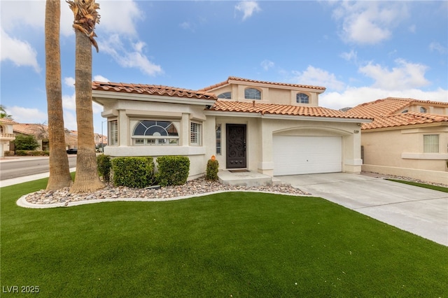 8780 Autumn Wreath Ave, Las Vegas, NV 89129 - mediterranean / spanish house with driveway, an attached garage, a front yard, and stucco siding
