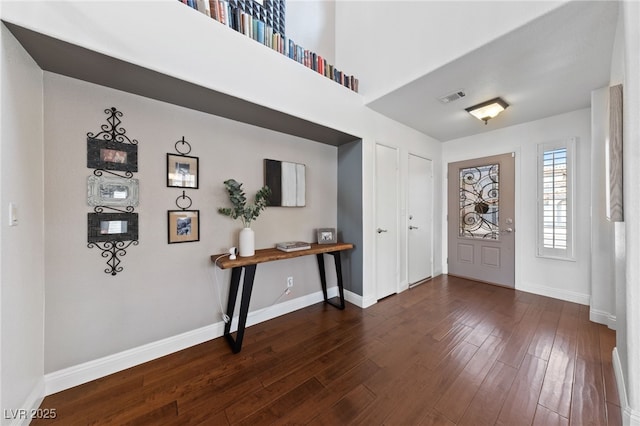 8780 Autumn Wreath Ave, Las Vegas, NV 89129 - foyer with dark wood-type flooring and baseboards