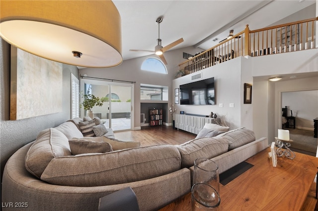 8780 Autumn Wreath Ave, Las Vegas, NV 89129 - living room with ceiling fan, wood finished floors, and high vaulted ceiling