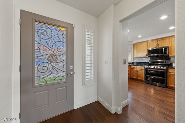 8780 Autumn Wreath Ave, Las Vegas, NV 89129 - entryway with dark wood-type flooring, baseboards, and recessed lighting