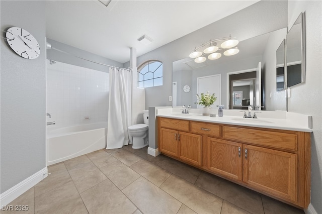 8780 Autumn Wreath Ave, Las Vegas, NV 89129 - bathroom with double vanity, shower / bath combo with shower curtain, toilet, tile patterned floors, and baseboards