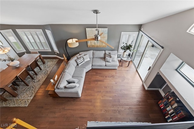 8780 Autumn Wreath Ave, Las Vegas, NV 89129 - living room featuring wood finished floors, ceiling fan, and baseboards
