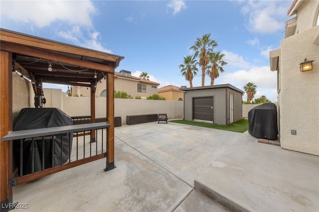 8780 Autumn Wreath Ave, Las Vegas, NV 89129 - fenced backyard with a patio area and grilling area