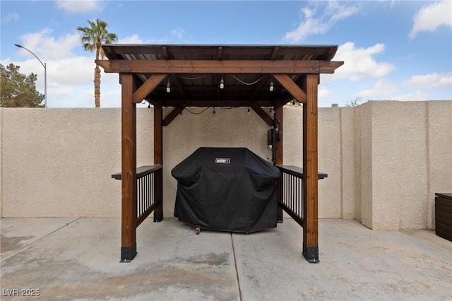 8780 Autumn Wreath Ave, Las Vegas, NV 89129 - fenced backyard featuring a patio area and a gazebo