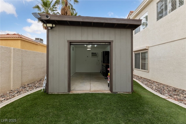 8780 Autumn Wreath Ave, Las Vegas, NV 89129 - garage with a shed and a wall mounted AC