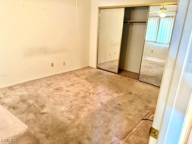 7570 W Flamingo Rd Unit 202, Las Vegas, NV 89147 - unfurnished bedroom with carpet flooring and a closet