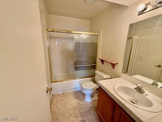 7570 W Flamingo Rd Unit 202, Las Vegas, NV 89147 - bathroom with vanity, toilet, and enclosed tub / shower combo