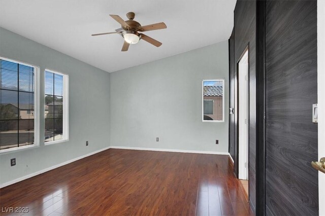 8389 Charlton Valley Ct, Las Vegas, NV 89123 - spare room featuring wood finished floors, a ceiling fan, and baseboards