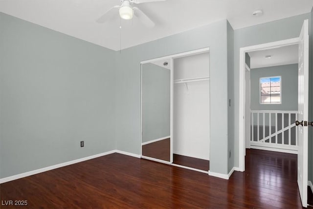 8389 Charlton Valley Ct, Las Vegas, NV 89123 - unfurnished bedroom featuring wood finished floors, a closet, baseboards, and a ceiling fan