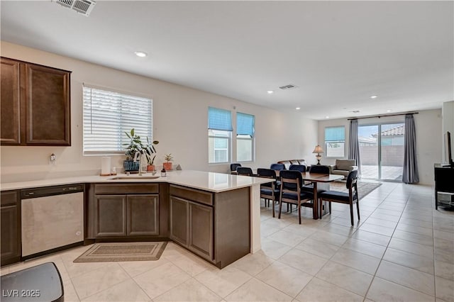 4293 Nopal Serrano Ave, Las Vegas, NV 89141 - kitchen featuring stainless steel dishwasher, a sink, healthy amount of natural light, open floor plan, and recessed lighting