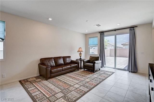 4293 Nopal Serrano Ave, Las Vegas, NV 89141 - living room featuring light tile patterned flooring, baseboards, and recessed lighting