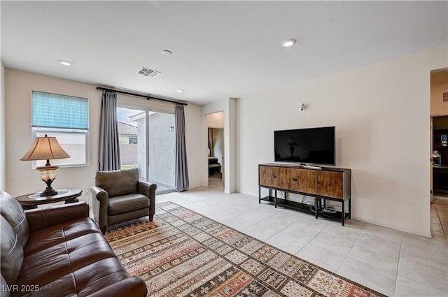 4293 Nopal Serrano Ave, Las Vegas, NV 89141 - living room with light tile patterned flooring, baseboards, and recessed lighting