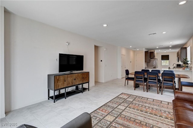4293 Nopal Serrano Ave, Las Vegas, NV 89141 - living room featuring light tile patterned flooring and recessed lighting
