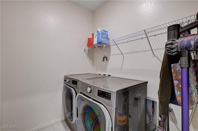 4293 Nopal Serrano Ave, Las Vegas, NV 89141 - laundry area with washing machine and dryer and baseboards