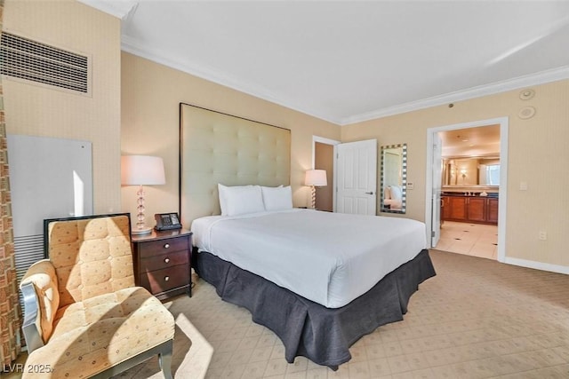 135 E Harmon Ave Unit 1401, Las Vegas, NV 89109 - bedroom with crown molding, ensuite bathroom, baseboards, and light carpet