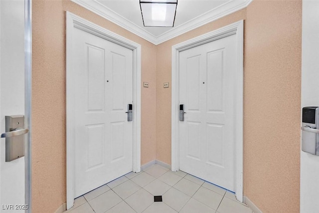 135 E Harmon Ave Unit 1401, Las Vegas, NV 89109 - entryway with light tile patterned flooring, baseboards, and crown molding