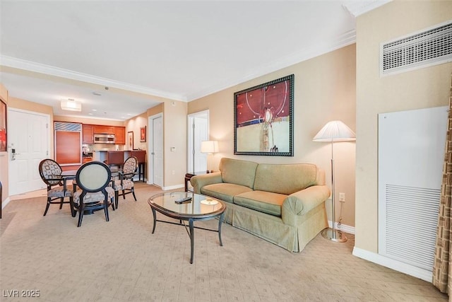 135 E Harmon Ave Unit 1401, Las Vegas, NV 89109 - living area featuring baseboards and ornamental molding