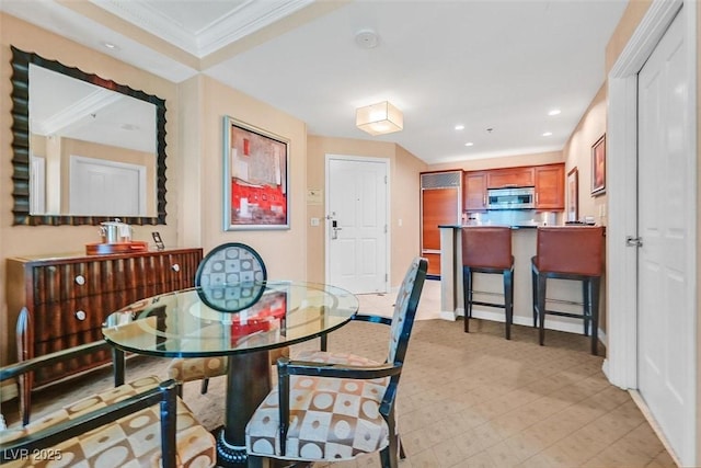 135 E Harmon Ave Unit 1401, Las Vegas, NV 89109 - dining room with crown molding, recessed lighting, and baseboards