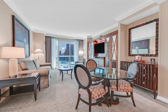 135 E Harmon Ave Unit 1401, Las Vegas, NV 89109 - dining area featuring ornamental molding, baseboards, and light carpet