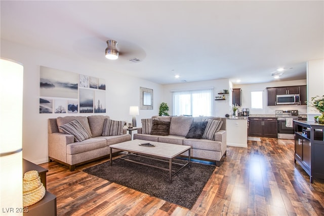 6819 Citron Mist Ct, North Las Vegas, NV 89086 - living area featuring dark wood finished floors and ceiling fan