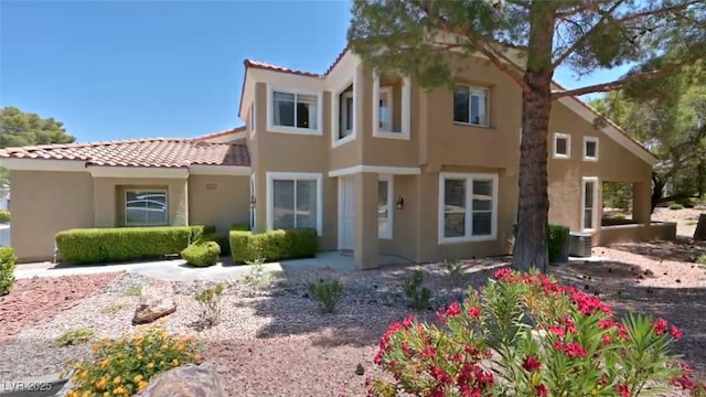 2033 Summer Spruce Pl Unit 102, Las Vegas, NV 89134 - mediterranean / spanish home with stucco siding and a tiled roof