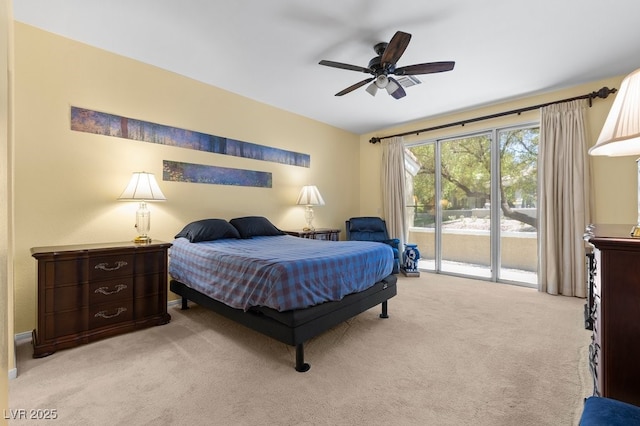 2033 Summer Spruce Pl Unit 102, Las Vegas, NV 89134 - bedroom featuring access to exterior, light carpet, and a ceiling fan