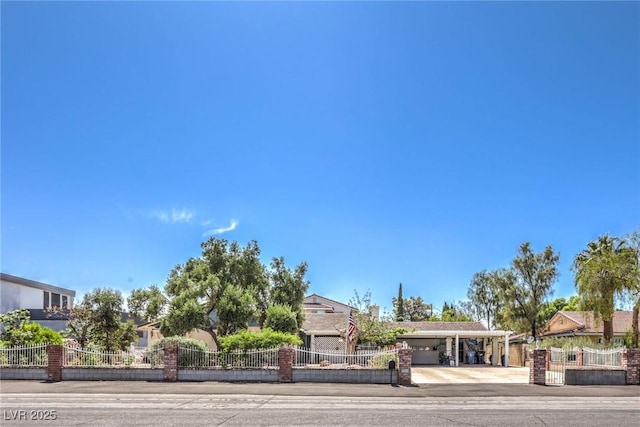 2045 S Tenaya Way, Las Vegas, NV 89117 - view of front of house with a fenced front yard and concrete driveway