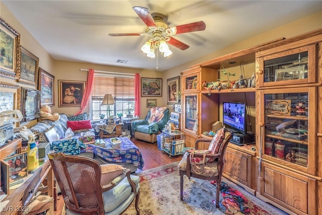 2045 S Tenaya Way, Las Vegas, NV 89117 - sitting room featuring ceiling fan and wood finished floors