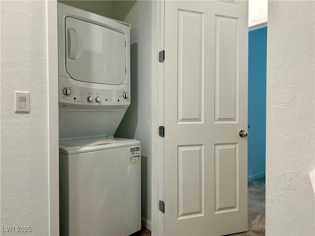 965 Nevada State Dr Unit 39102, Henderson, NV 89002 - laundry area with stacked washer / drying machine and a textured wall