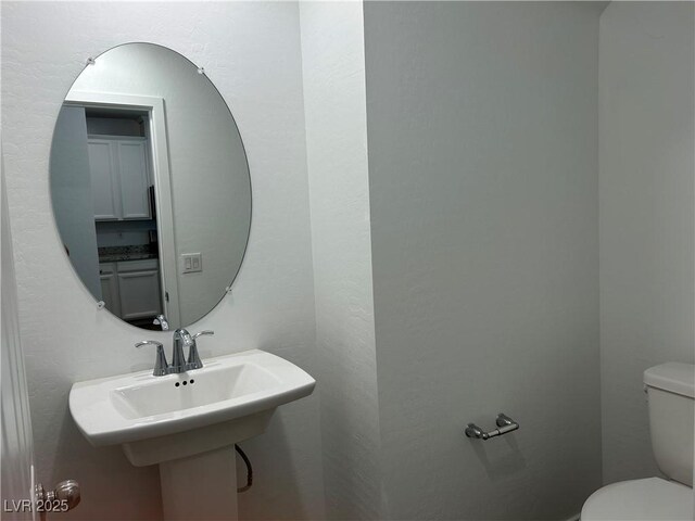 965 Nevada State Dr Unit 39102, Henderson, NV 89002 - half bath featuring toilet and a sink
