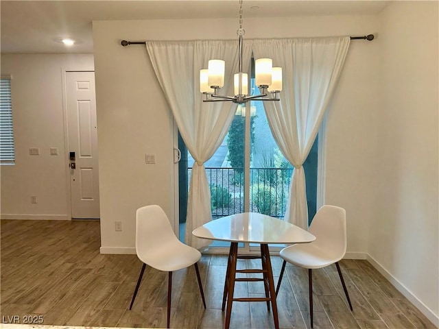965 Nevada State Dr Unit 39102, Henderson, NV 89002 - dining area with a chandelier, wood finished floors, and recessed lighting