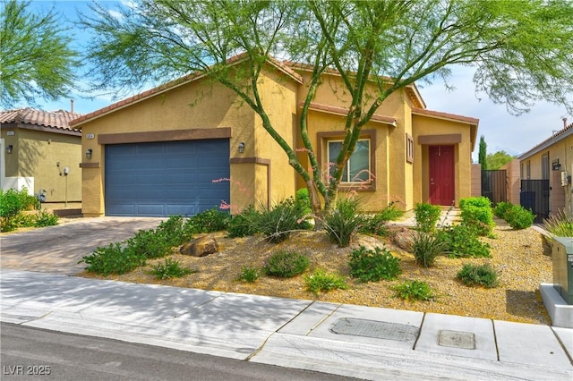 5854 Olivine Falls Ave, Las Vegas, NV 89130 - view of front facade with stucco siding, an attached garage, driveway, and cooling unit